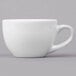 A close-up of a Libbey Basics bright white porcelain espresso cup with a handle.