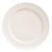 A close up of a Libbey bright white porcelain plate with swirls on it.