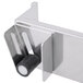 A stainless steel Matfer Bourgeat wall mounted utensil holder rack.