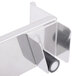 A silver metal Matfer Bourgeat wall mounted utensil holder rack.