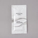 A case of 500 white Dial hand and body lotion bottles. Each bottle has a white and black label.