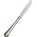 A silver knife with a solid handle.