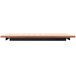 A brown rectangular Tablecraft carving station template with perforations.