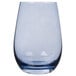 A close up of a clear Stolzle stemless wine glass with a blue rim.
