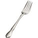 A Bon Chef Queen Anne salad/dessert fork with a silver handle.