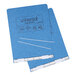 A light blue Universal top bound hanging data post binder with white plastic clips.