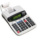 A Victor black thermal printing calculator with a roll of paper on it.
