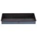 A black rectangular non-stick cake pan with a white stripe on the bottom.