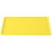 A yellow rectangular cast aluminum Tablecraft cooling platter.