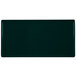 A rectangular hunter green cast aluminum cooling platter.