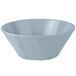 A gray Tablecraft cast aluminum serving bowl with a wavy design.