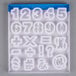 A blue plastic package of Ateco plastic numbers and symbols.