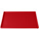 A red rectangular Tablecraft cast aluminum cooling platter.