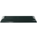 A hunter green rectangular cast aluminum platter on a counter.