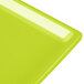 A lime green Tablecraft cast aluminum rectangular cooling tray.