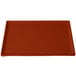 A copper rectangular cast aluminum cooling platter.