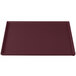 A maroon rectangular cast aluminum cooling platter with a rectangular edge.