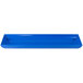 A cobalt blue rectangular cast aluminum tray with flared edges.