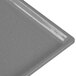 A Tablecraft granite cast aluminum rectangular cooling platter with a silver handle.