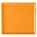 An orange rectangular cast aluminum cooling platter with a white background.