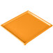 An orange rectangular cast aluminum cooling platter.