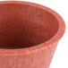 A HS Inc. Paprika Ramekin on a table.