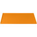 A rectangular orange cast aluminum cooling platter on a white background.