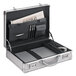 A Solo Titanium Pro Attache briefcase with a newspaper, pen, and laptop inside.