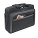 A Solo black briefcase with a cell phone in the pocket.