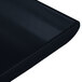 A close-up of a black rectangular Tablecraft platter with blue speckles.