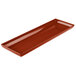 A copper rectangular cast aluminum platter.