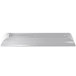 A natural cast aluminum rectangular platter on a white surface.