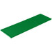 A green rectangular cast aluminum cooling platter.