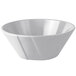 A natural cast aluminum serving bowl with a curved design.