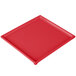 A red rectangular Tablecraft cast aluminum cooling platter.