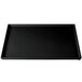 A black rectangular Tablecraft cooling platter with green speckles on a white background.