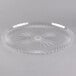 A clear plastic Fineline Catering tray with a scalloped design.