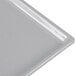 A natural cast aluminum rectangular cooling platter with a silver edge.