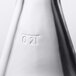 A close-up of a Stolzle Pisa carafe with a pour line.