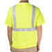 A man wearing a Cordova lime yellow high visibility safety shirt.