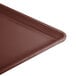 A brown Cambro dietary tray with a brown lid.