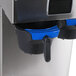 A Curtis dual tea and coffee brewer with black and blue containers.