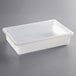 A white plastic food storage container with a white lid.