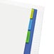 A close-up of a file folder with a blue and green Redi-Tag index tab.