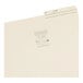 A Smead manila file folder with a white label inside.