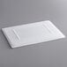 A white plastic lid for a food storage box.