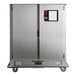 A stainless steel Metro heated banquet cabinet with two doors.