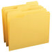 A close-up of a Smead goldenrod file folder with a white background.