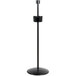 A black metal Marco Company floor mount produce bag stand.
