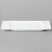 A white rectangular Schonwald porcelain platter with contoured edges.